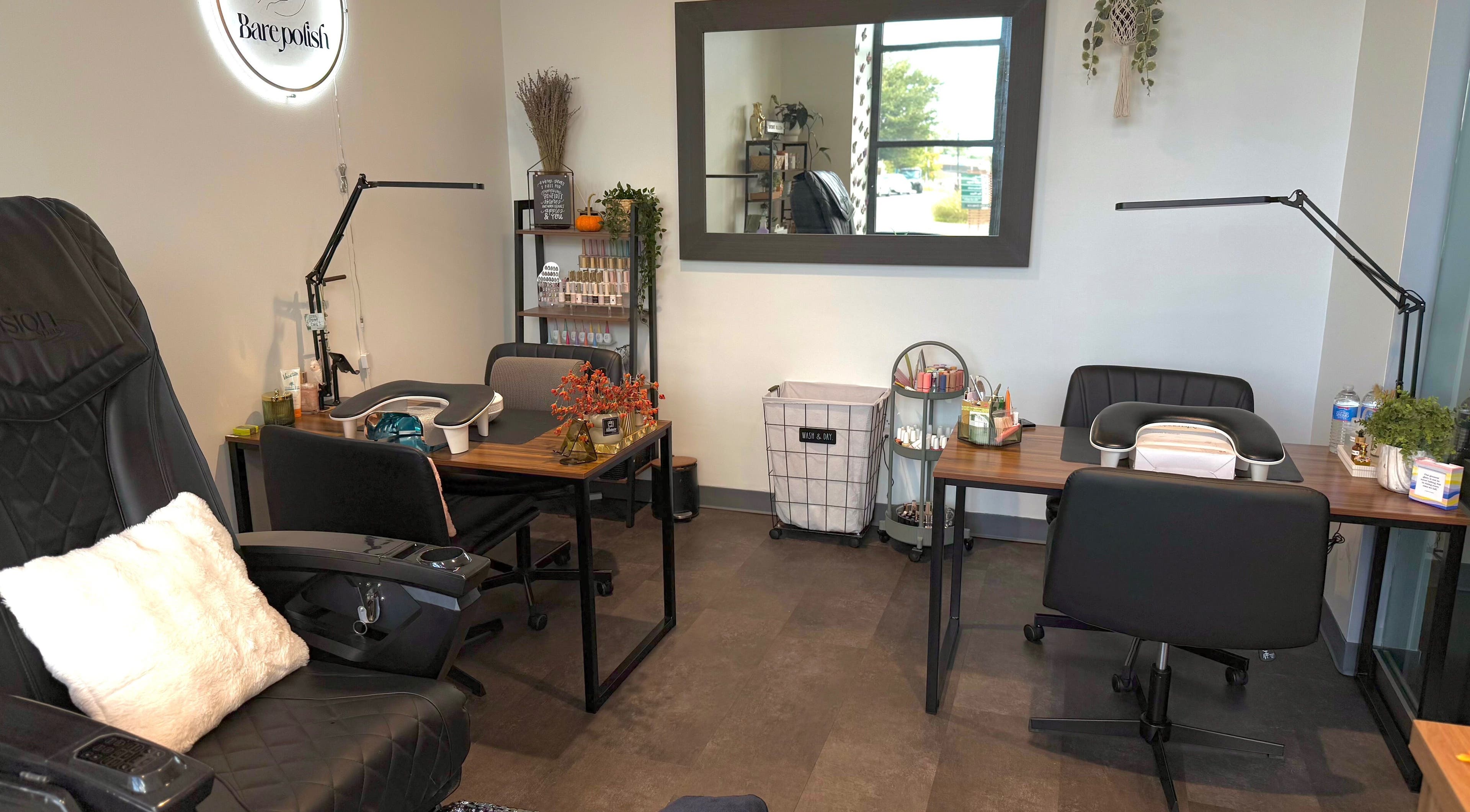 Stylish salon setup at Barepolish, Sterling, Virginia, US with modern decor and comfortable seating.