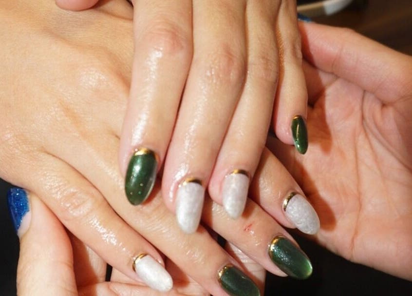 Elegant manicure with green and white nails at Barepolish in Sterling, Virginia, US.