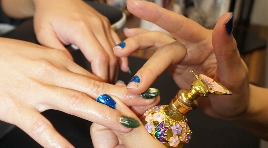 Nail art application at Barepolish, Sterling, Virginia, US, enhancing beauty with elegant polish and design.