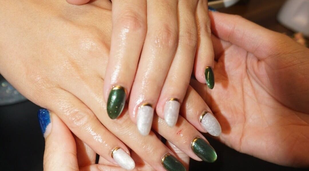 Elegant green and white nails at Barepolish, Sterling, Virginia, US, showcasing artistry and style.