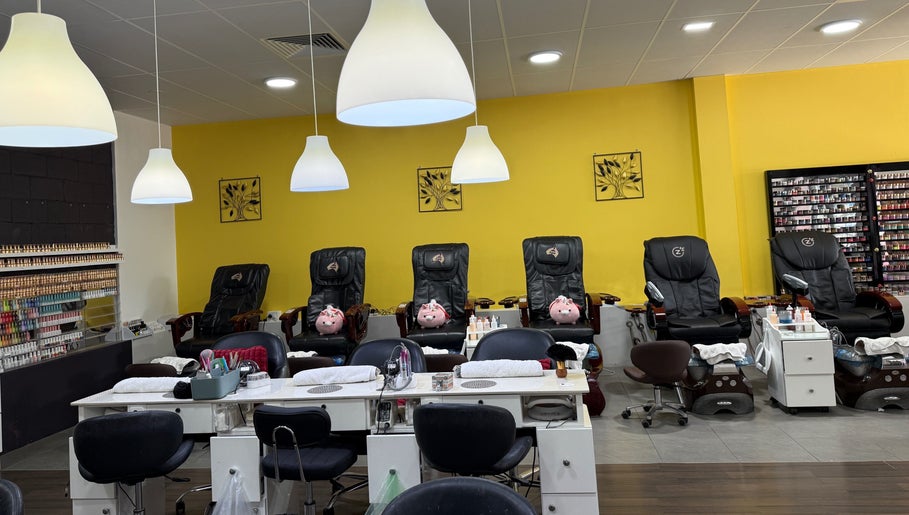 Modern interior of Diamond Nails & Beauty in Mount Barker, South Australia, featuring plush nail stations and vibrant decor.