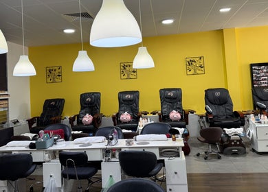 Modern interior of Diamond Nails & Beauty in Mount Barker, South Australia, featuring plush nail stations and vibrant decor.