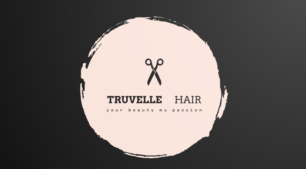 Truvelle Hair logo featuring scissors at Edensor Park, New South Wales, AU, highlighting beauty passion.