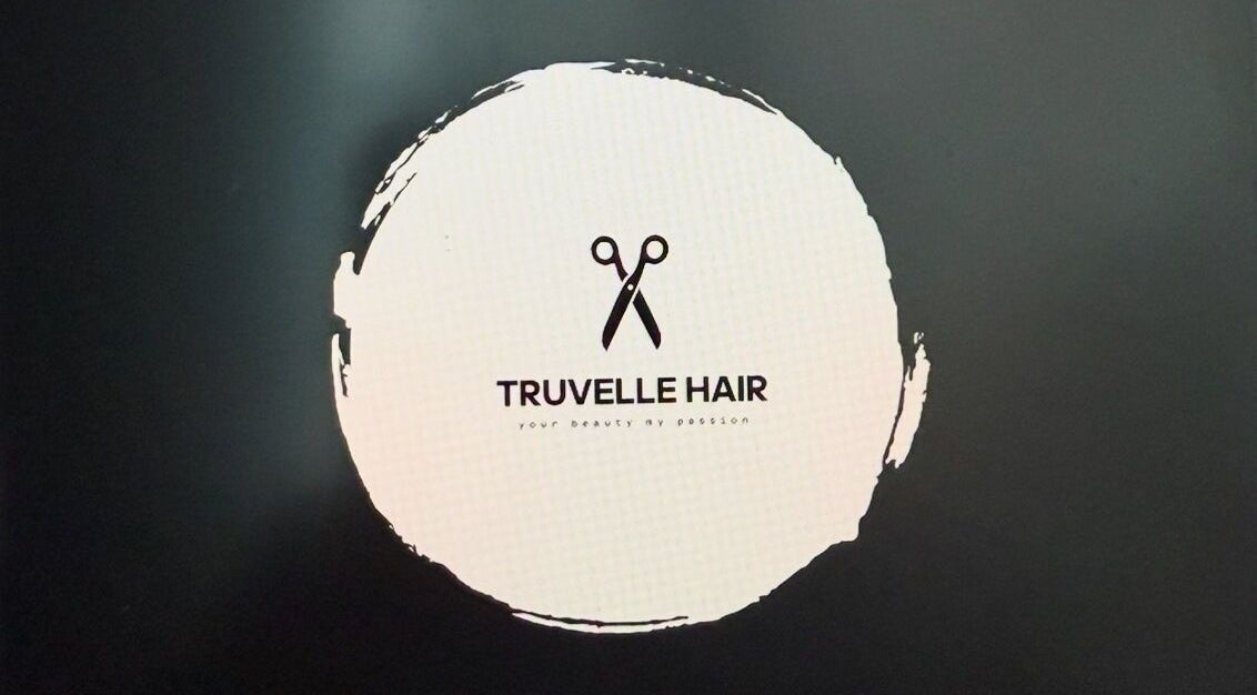 Truvelle Hair salon logo featuring scissors, located in Edensor Park, New South Wales, AU.