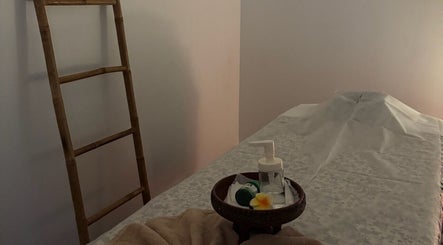 Relaxing massage room at ElE Thai Massage, Victoria, Victoria, AU with a tranquil setup and soft lighting.