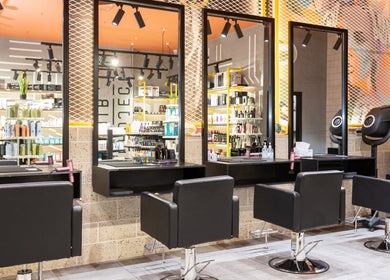 Modern interior of Project Hair Salon in Port Adelaide, South Australia, AU with stylish furnishings.