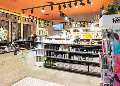 Modern interior of Project Hair Salon, Port Adelaide, South Australia, AU showcasing products and styling stations.