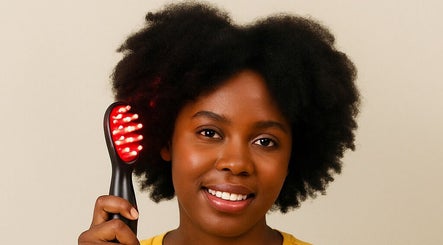 Woman enjoying hair treatment at Ami & Jiarra - Hair Spa in Gatineau, Quebec, CA.