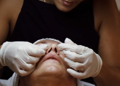 Therapist performing facial treatment at Antonia Formosa Skin Therapist in St Julian's, MT.