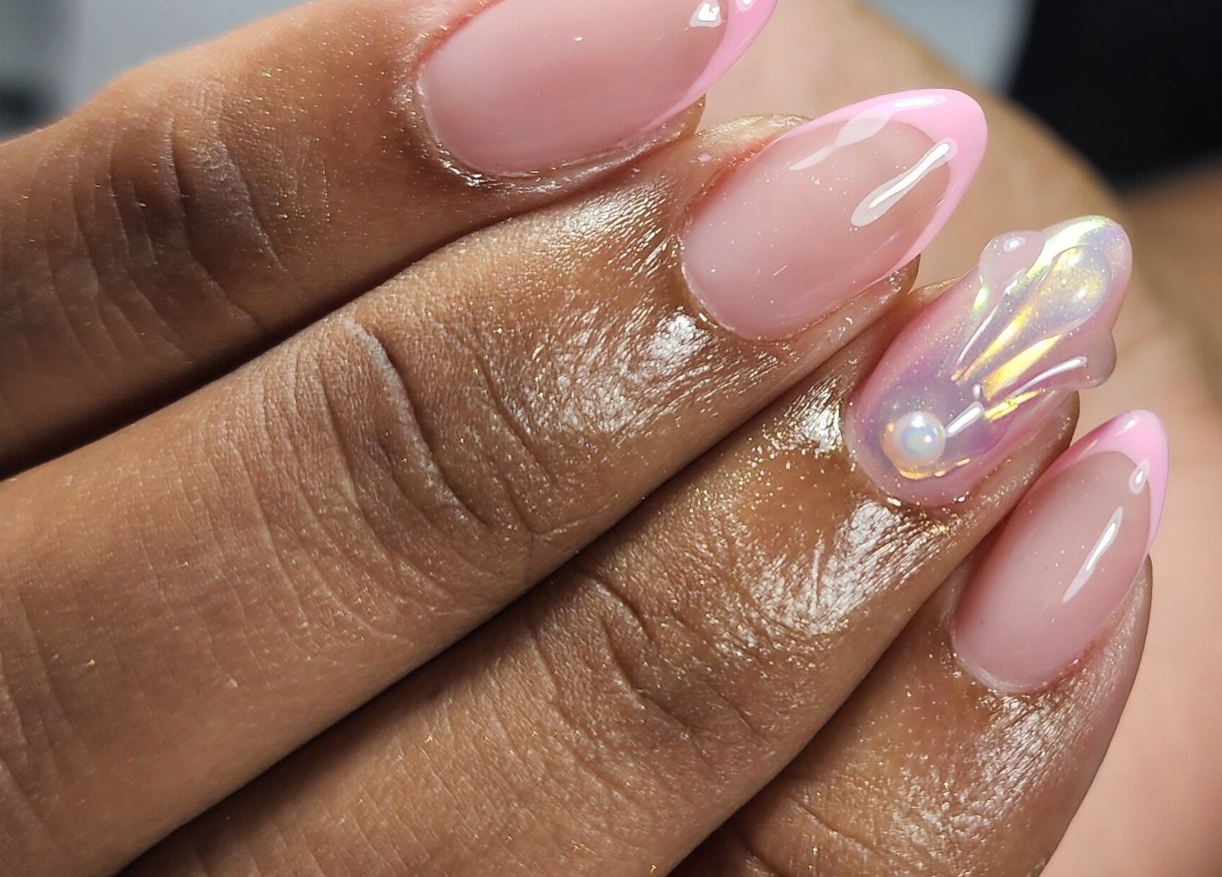 Beautiful iridescent nail art with pearl accent at Nailed by Kuki, Willemstad, CW.