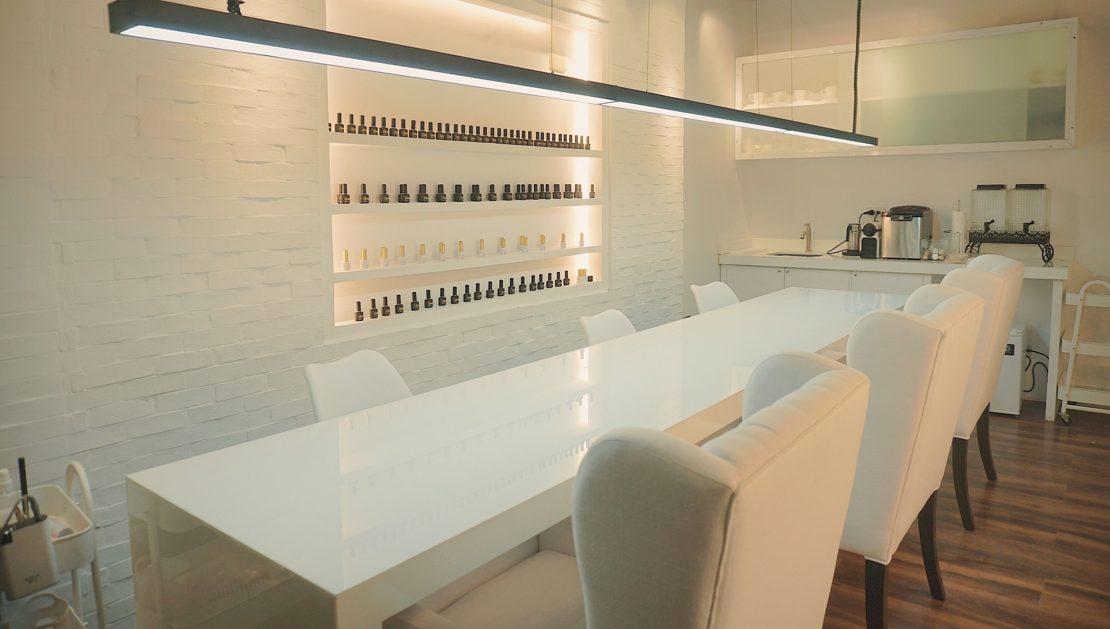 Spacious interior of Claws Studio in Mandaluyong City, Metro Manila, PH with sleek nail polish displays.