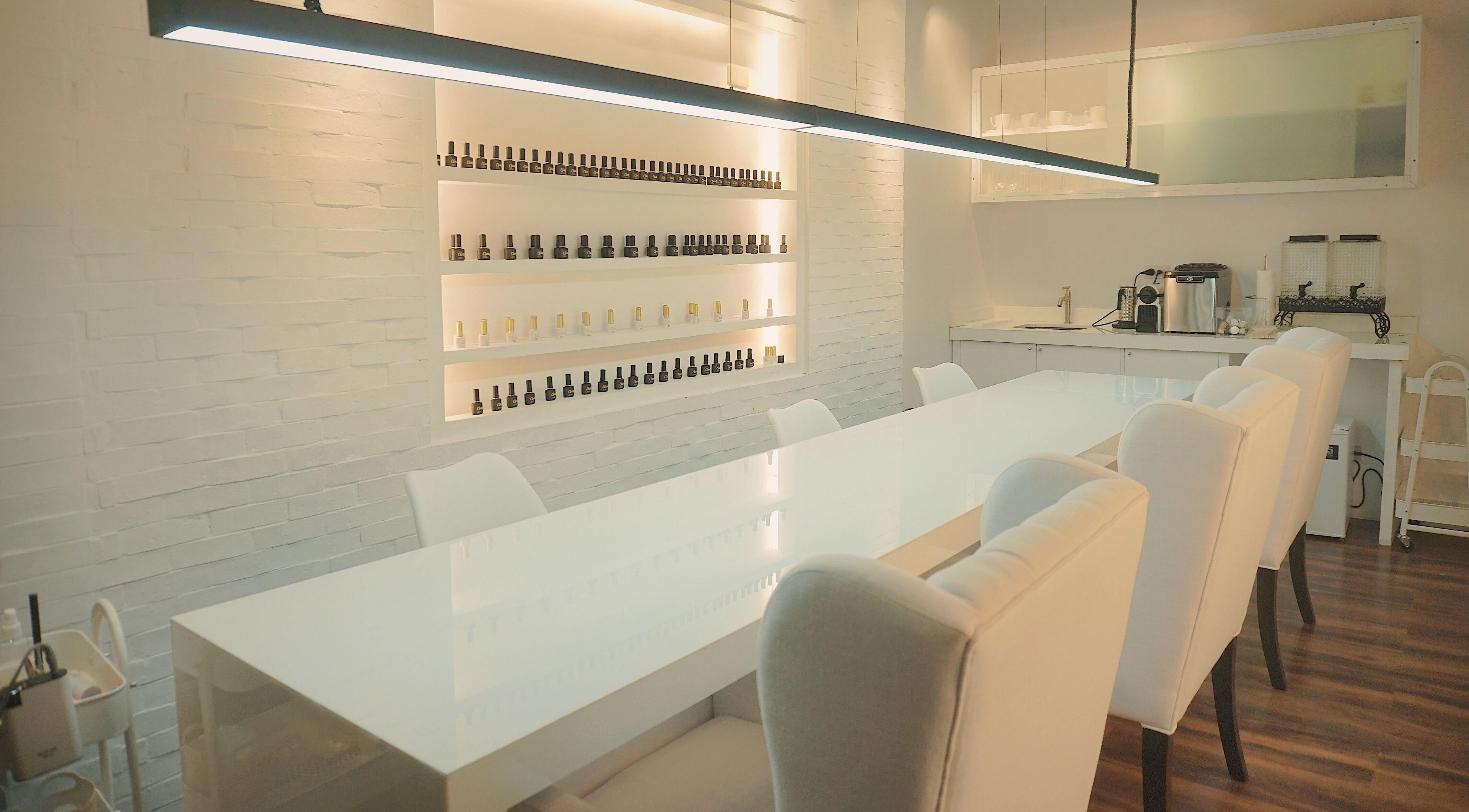 Spacious interior of Claws Studio in Mandaluyong City, Metro Manila, PH with sleek nail polish displays.