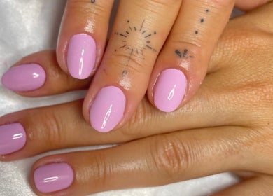 Elegant lavender nails by Leticia Jameli in Mermaid Beach, Queensland, AU with delicate finger tattoos.