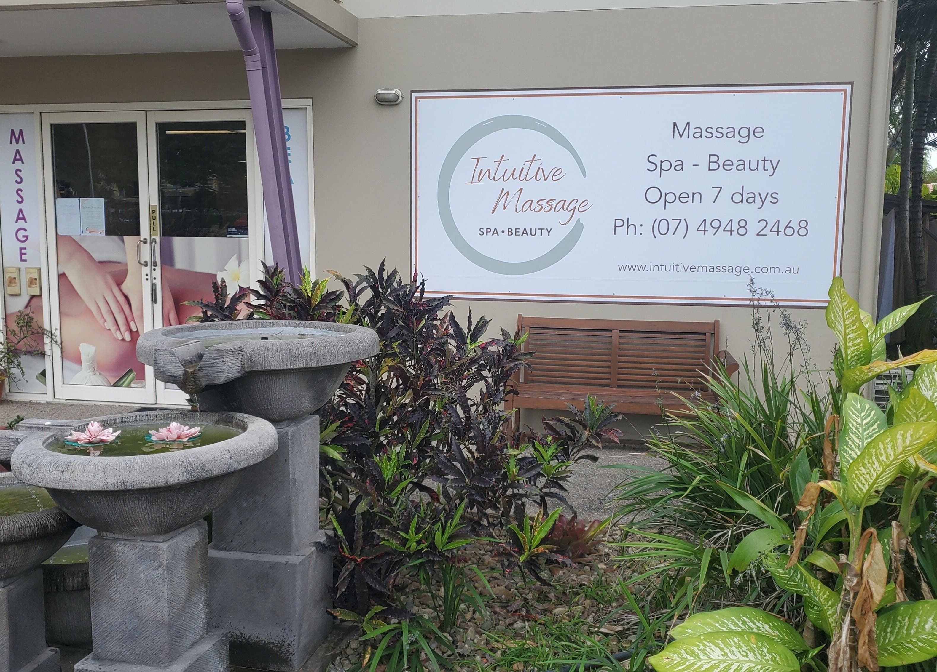 Entrance of Intuitive Massage Spa Beauty in Cannonvale, Queensland, AU with calming water feature.