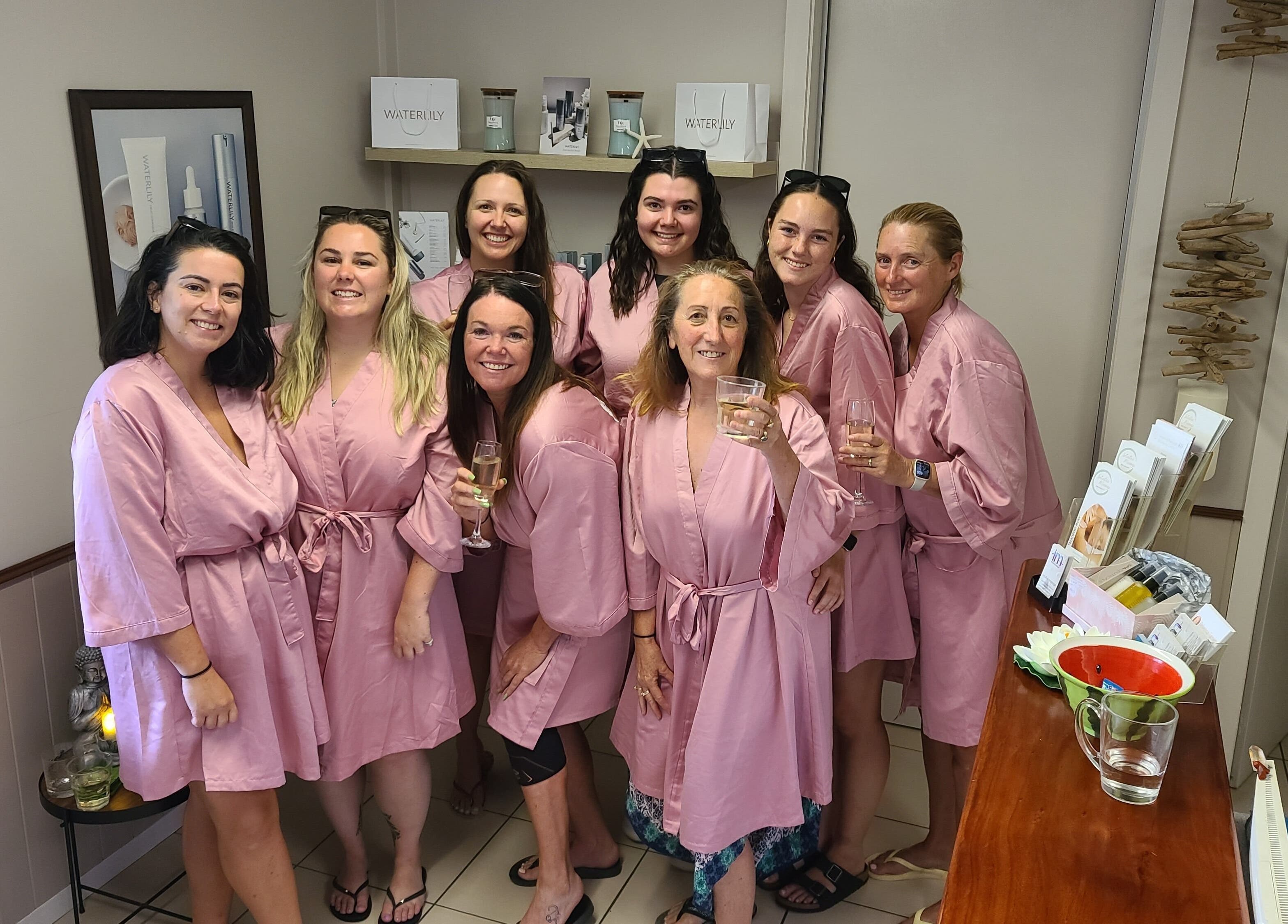 Women in matching pink robes enjoying a relaxing day at Intuitive Massage Spa Beauty in Cannonvale, Queensland, AU.