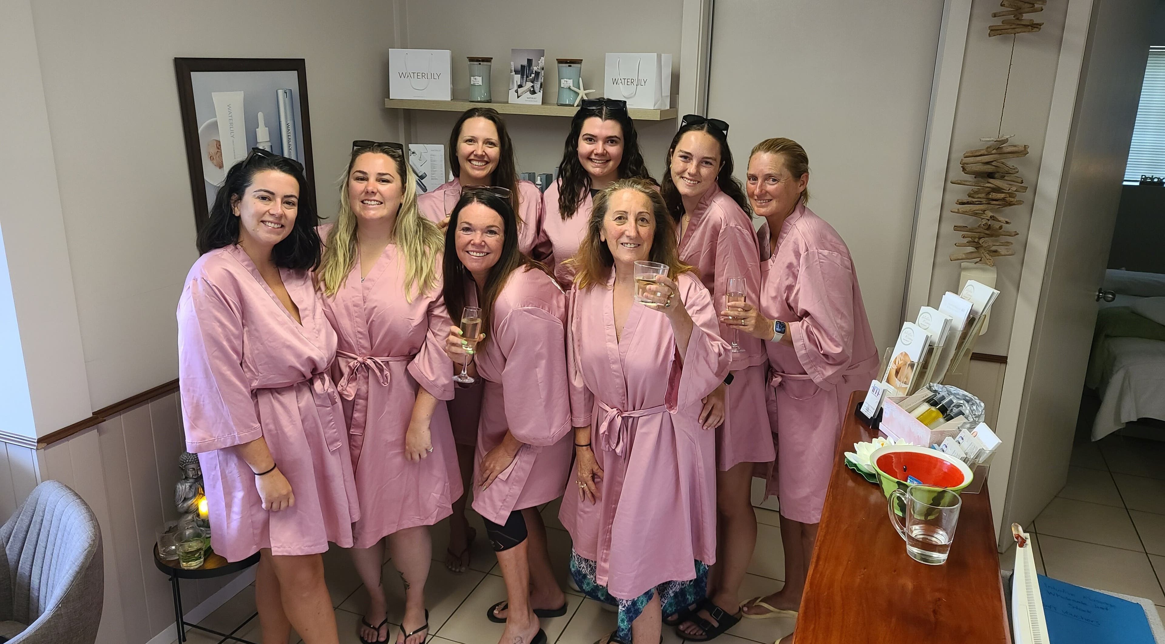 Women in matching pink robes enjoying a relaxing day at Intuitive Massage Spa Beauty in Cannonvale, Queensland, AU.
