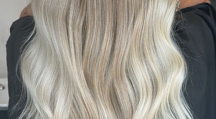 Blonde hair styled at Paigelouisehair, Derby, England, GB. Sleek and smooth finish.