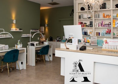 Reception and nail stations at A Scent of Beauty, Woodcroft, South Australia, AU showcasing elegant design.