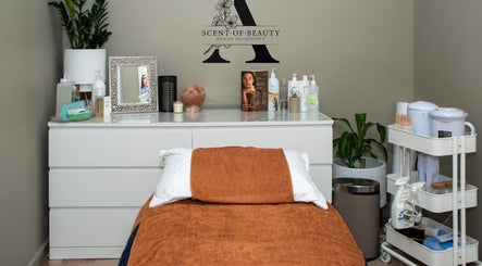 Relaxing treatment room at A Scent of Beauty, Woodcroft, South Australia, AU with cozy table and decor.