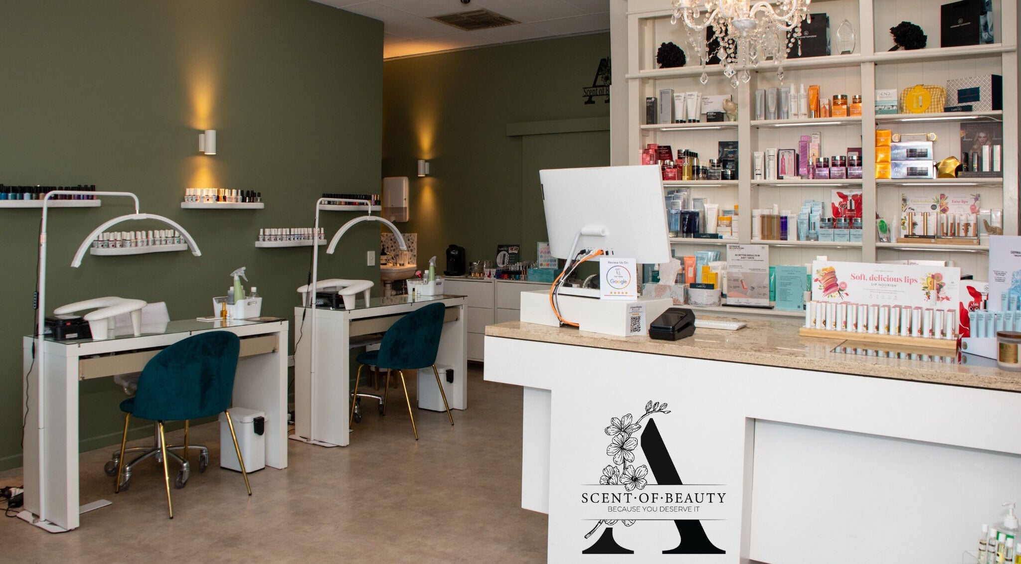 Interior of A Scent of Beauty in Woodcroft, South Australia, showcasing manicure stations and product shelves.