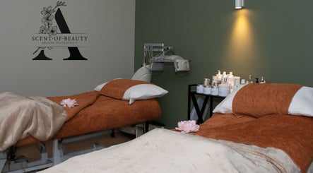 Relaxing spa treatment room at A Scent of Beauty, Woodcroft, South Australia, AU with cozy massage tables.
