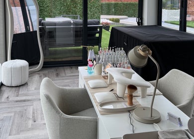 Modern nail station at Polished By Poppy, Unsworth, England, GB, featuring elegant decor and organized tools.