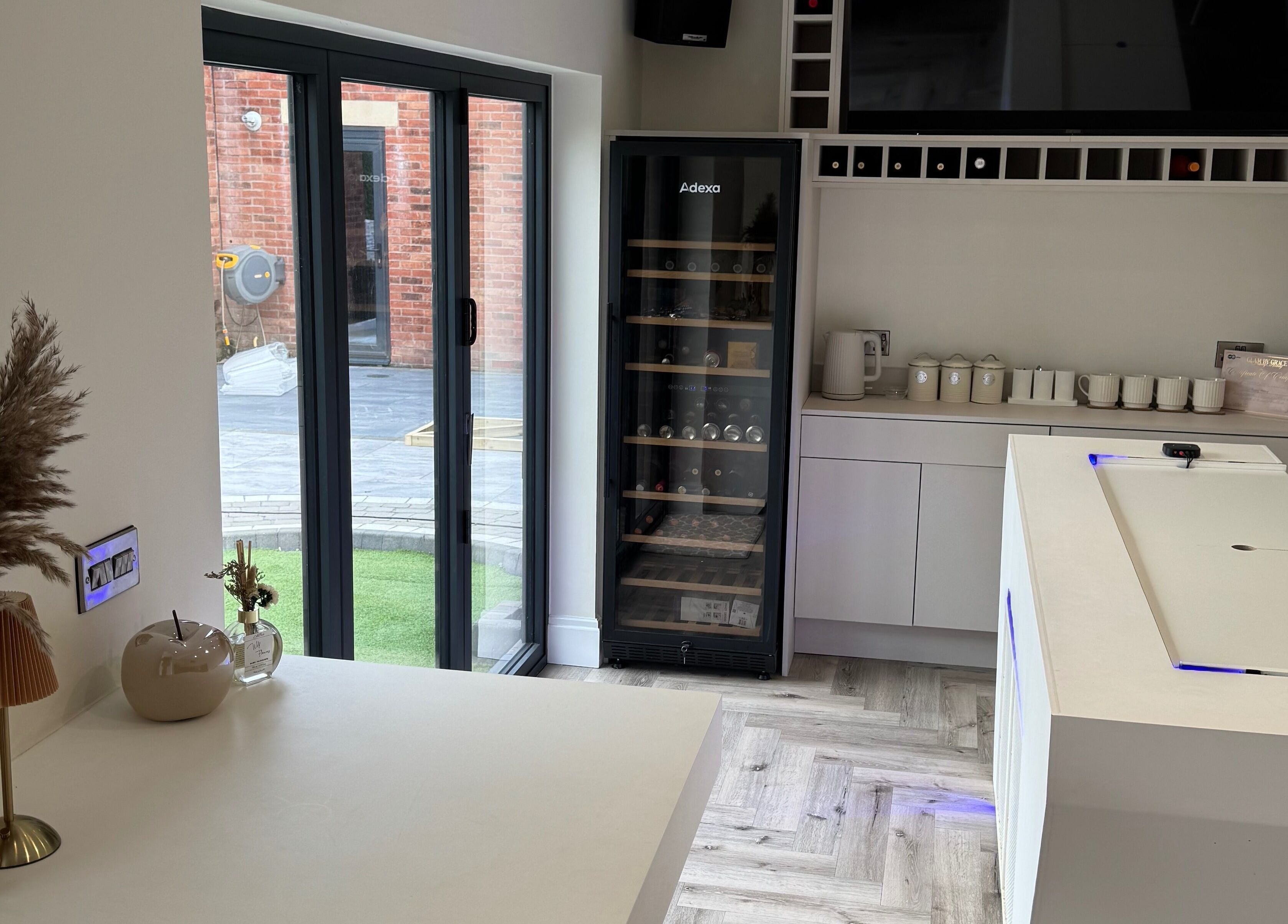 Elegant beauty lounge at Polished By Poppy, Unsworth, England, featuring modern decor and amenities.