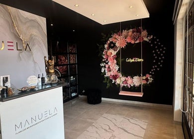 Stylish reception at Kalash Beauty and Aesthetics, Johannesburg, Gauteng, ZA, featuring floral decor.