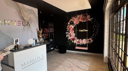 Stylish reception at Kalash Beauty and Aesthetics, Johannesburg, Gauteng, ZA, featuring floral decor.