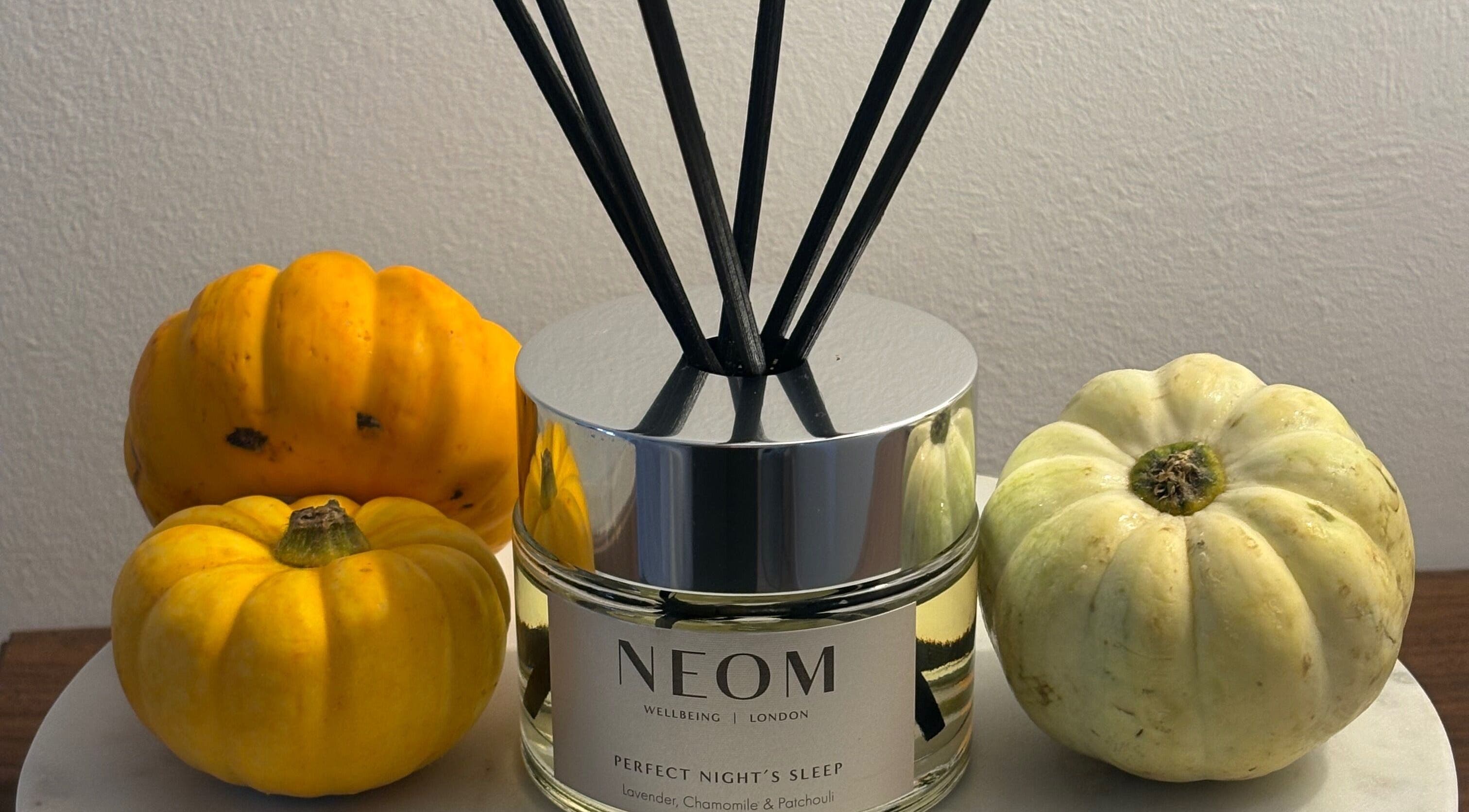 Netherfield Retreat in Castleford, England, GB displays Neom diffuser with small pumpkins, enhancing relaxation.