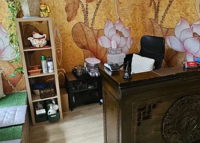 Reception area with lotus wall art at ShunHua Massage, Subiaco, Western Australia, AU.
