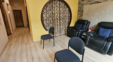 Cozy waiting area at ShunHua Massage Subiaco Square, Subiaco, Western Australia, AU with chairs and elegant decor.