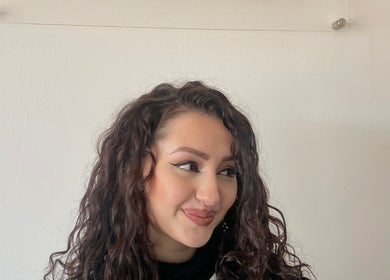 Elegant curly hairstyle at Kimiko Hair Studio, Pretoria, Gauteng, ZA, showcasing expert styling and beauty.