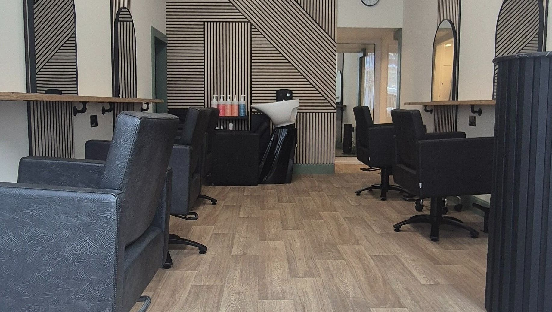 Modern salon at Capelli, Edinburgh, Scotland, GB with sleek chairs and stylish decor.