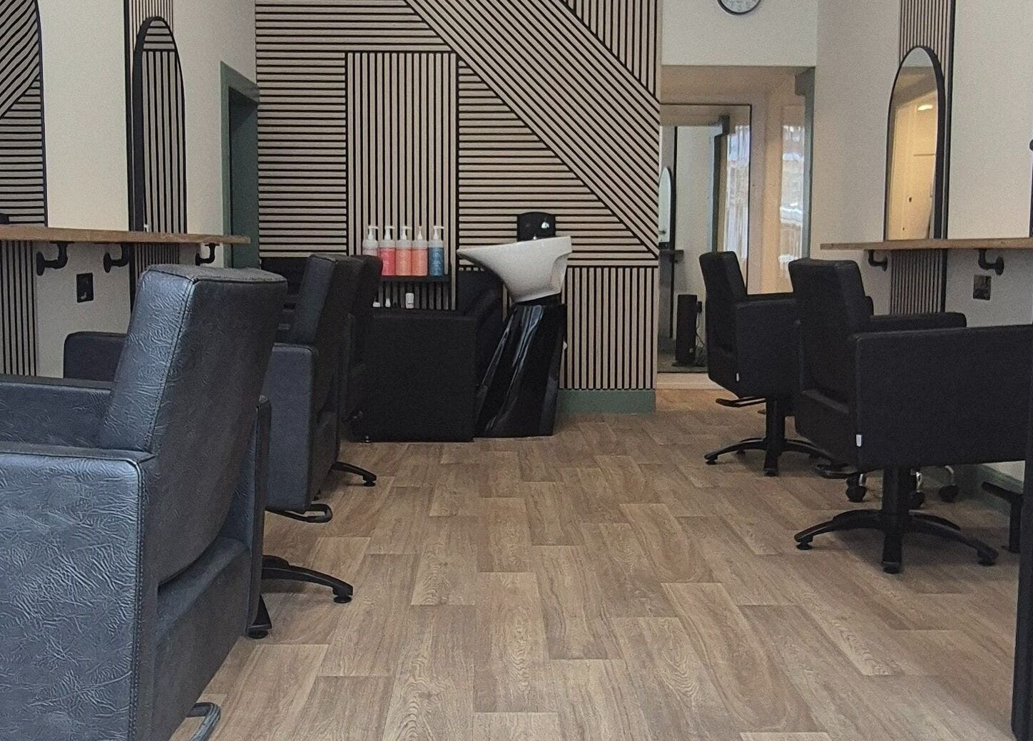 Modern salon at Capelli, Edinburgh, Scotland, GB with sleek chairs and stylish decor.
