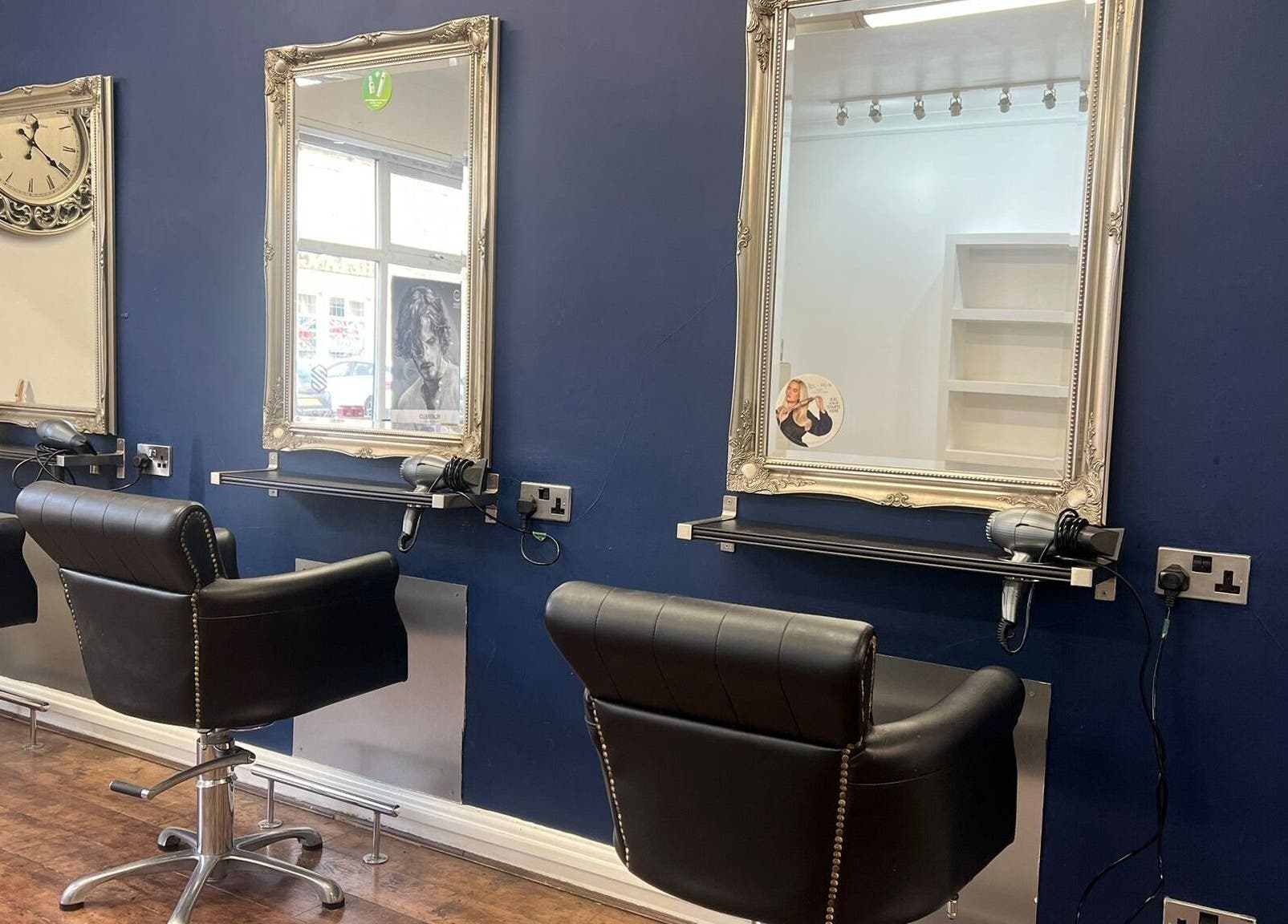Stylish salon interior with leather chairs at The Salon Langley Park, Langley Park, England, GB.