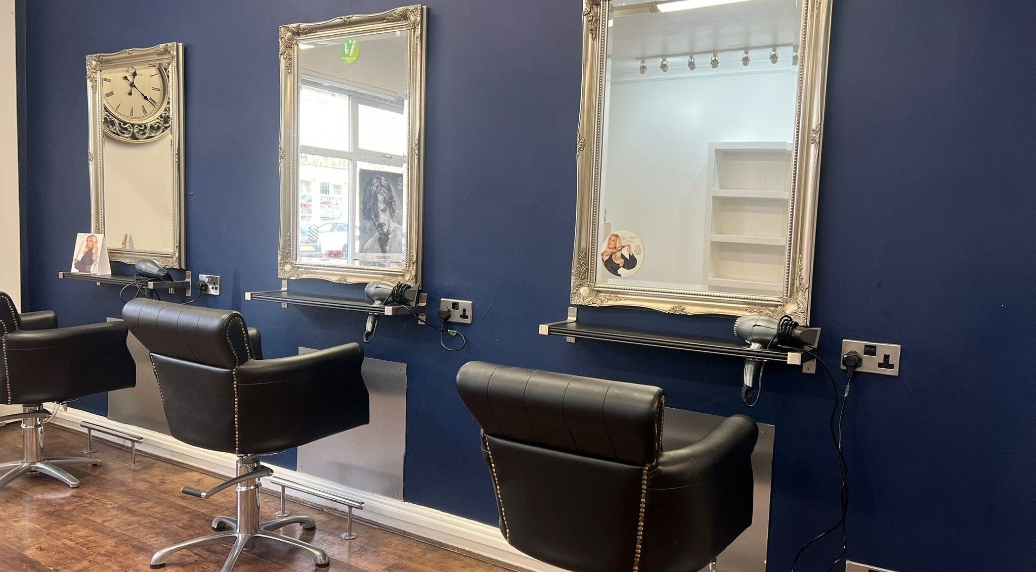 Stylish salon interior with leather chairs at The Salon Langley Park, Langley Park, England, GB.
