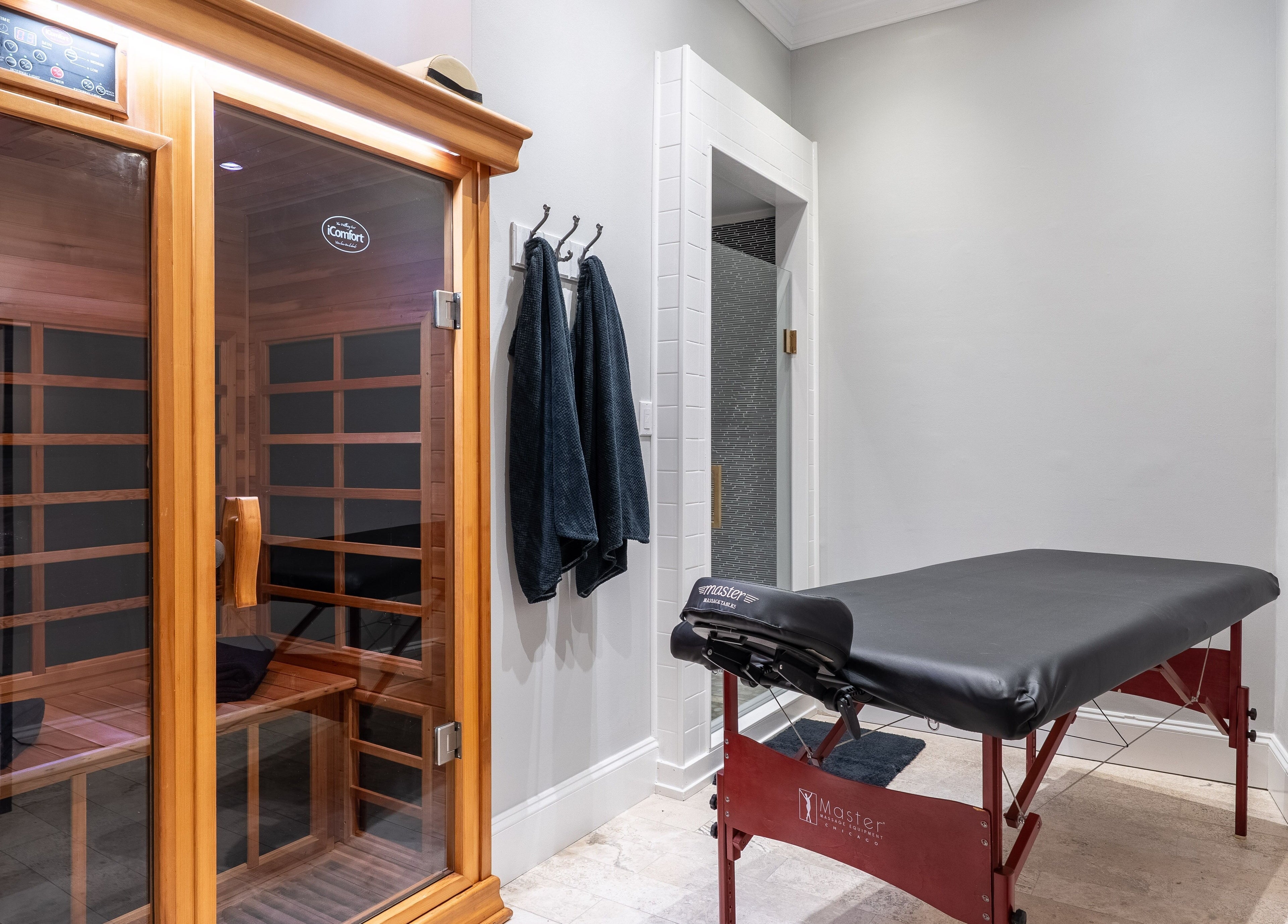 Relaxing massage table and sauna at The Waxing Strip (Aurora) in Aurora, Ontario, CA.