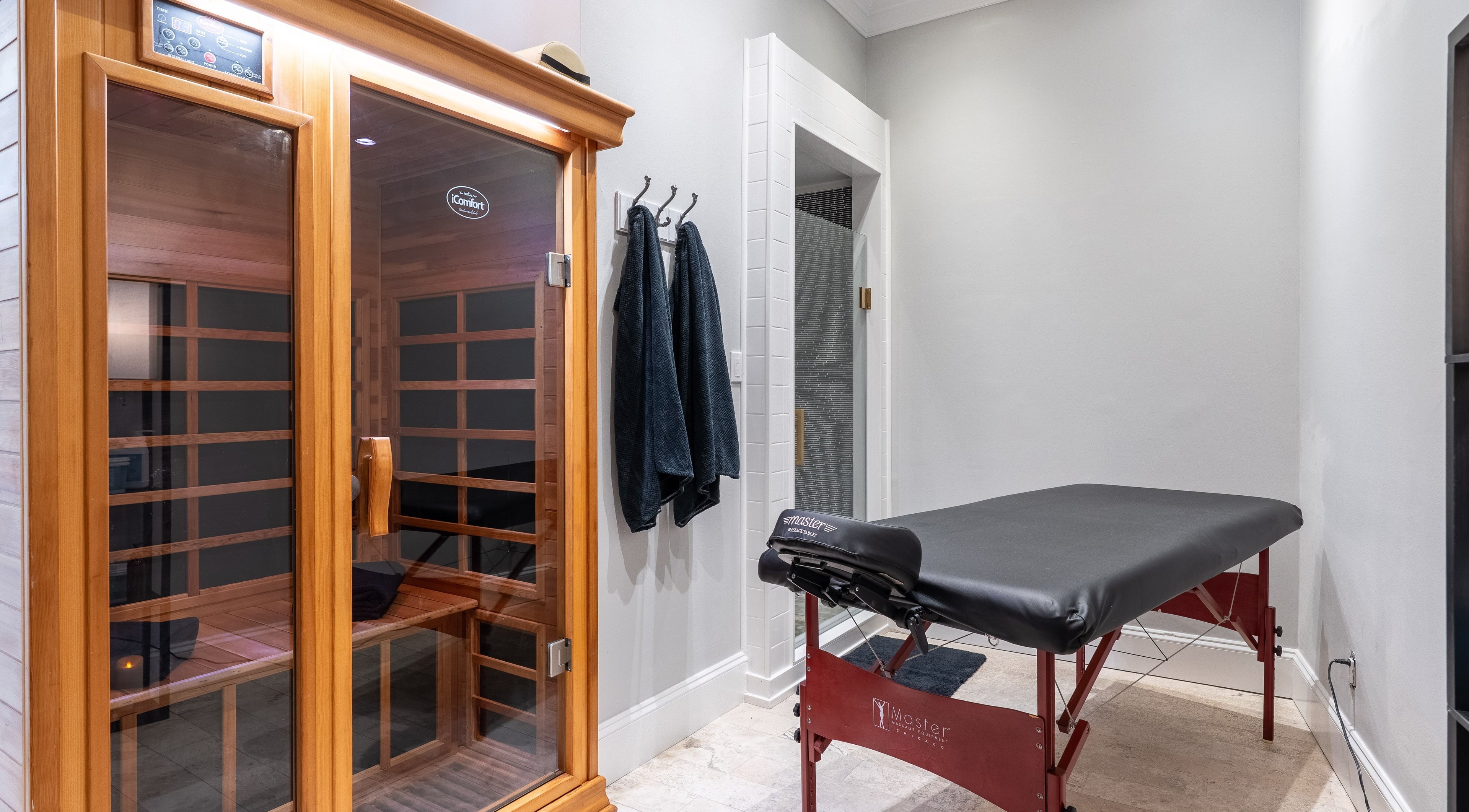 Relaxing massage table and sauna at The Waxing Strip (Aurora) in Aurora, Ontario, CA.