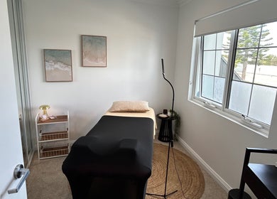 Tranquil therapy room at Beauty By Iona, Jindalee, Western Australia, AU with massage bed and serene decor.