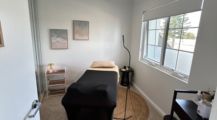 Tranquil therapy room at Beauty By Iona, Jindalee, Western Australia, AU with massage bed and serene decor.