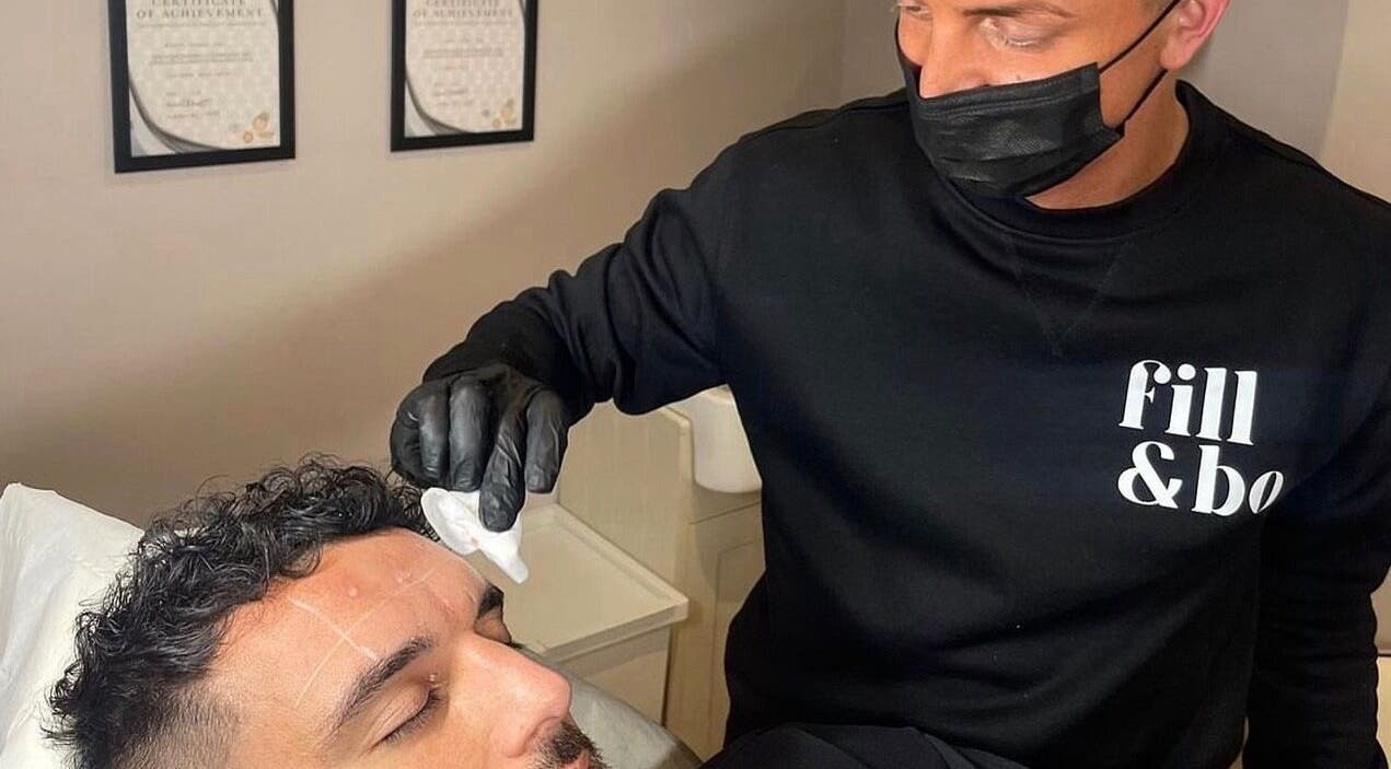 Expert administering skincare treatment at Fill&bo, Bournemouth, England, GB.