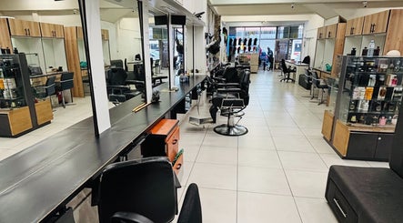 Interior of LAVISH LOOKS HAIR STUDIO in Cape Town, Western Cape, ZA, showcasing modern styling stations.