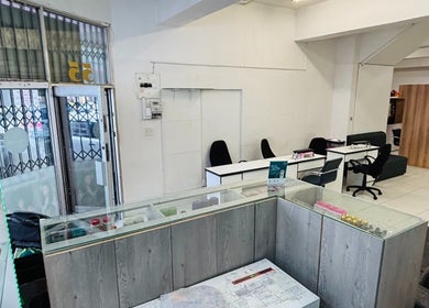 Modern interior of LAVISH LOOKS HAIR STUDIO in Cape Town, Western Cape, ZA with sleek workstations.