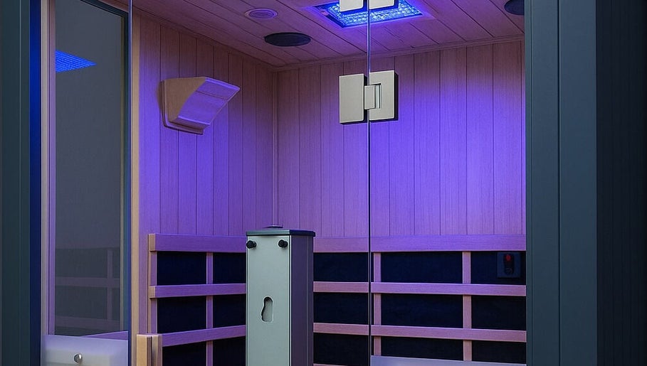 Elegant sauna at Sun Of A Beach Tanning in Taylor, Michigan, US, lit with soothing purple lights.