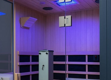 Elegant sauna at Sun Of A Beach Tanning in Taylor, Michigan, US, lit with soothing purple lights.