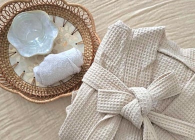 Relaxing spa robe and towel at Santara Thai Wellness, Salford, England, GB offer tranquil experiences.