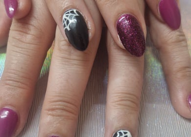 Stylish nail art with purple and black polish at Beauty By Aine, Athlone, County Roscommon, IE.