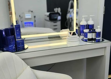 Aesthetic Cosmetology Clinic's chic vanity with skincare products in Aberdeen, Scotland, GB.