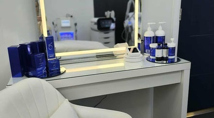 Aesthetic Cosmetology Clinic's chic vanity with skincare products in Aberdeen, Scotland, GB.